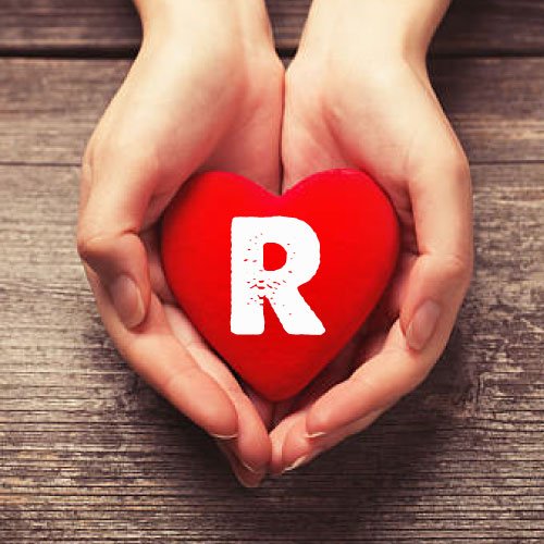 R love photo - heart in hands with R letter