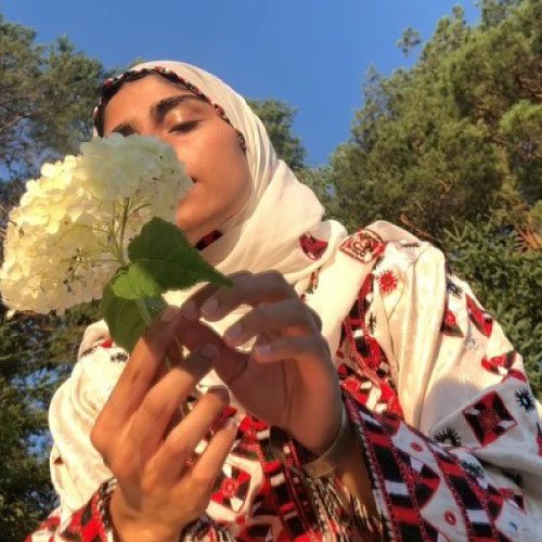 Balochi Dress Dp - flower in hand