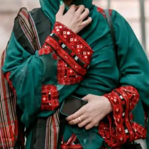 Baloch Dp - green dress
