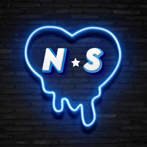 S N Photo - neon heart on wall