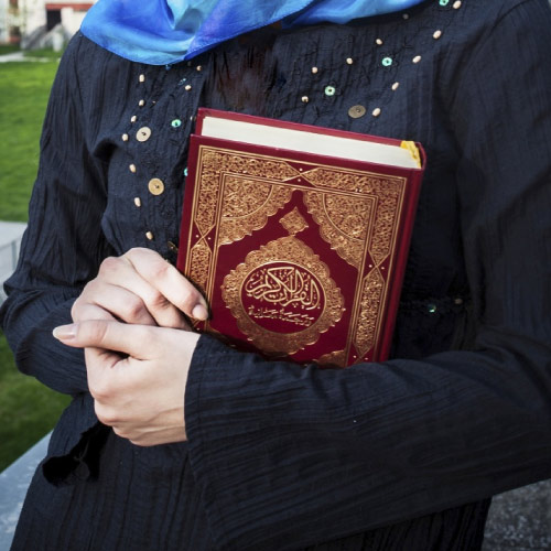 Quran Photo - girl hand quran pak
