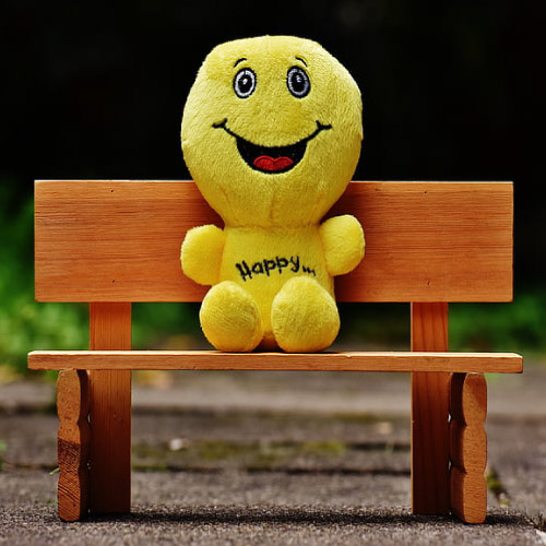 Smile Picture - emoji sit on chair